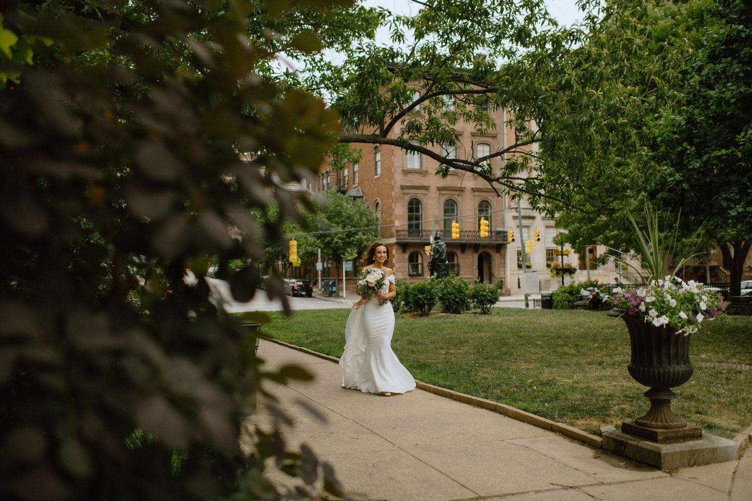 bride walks through mount vernon square