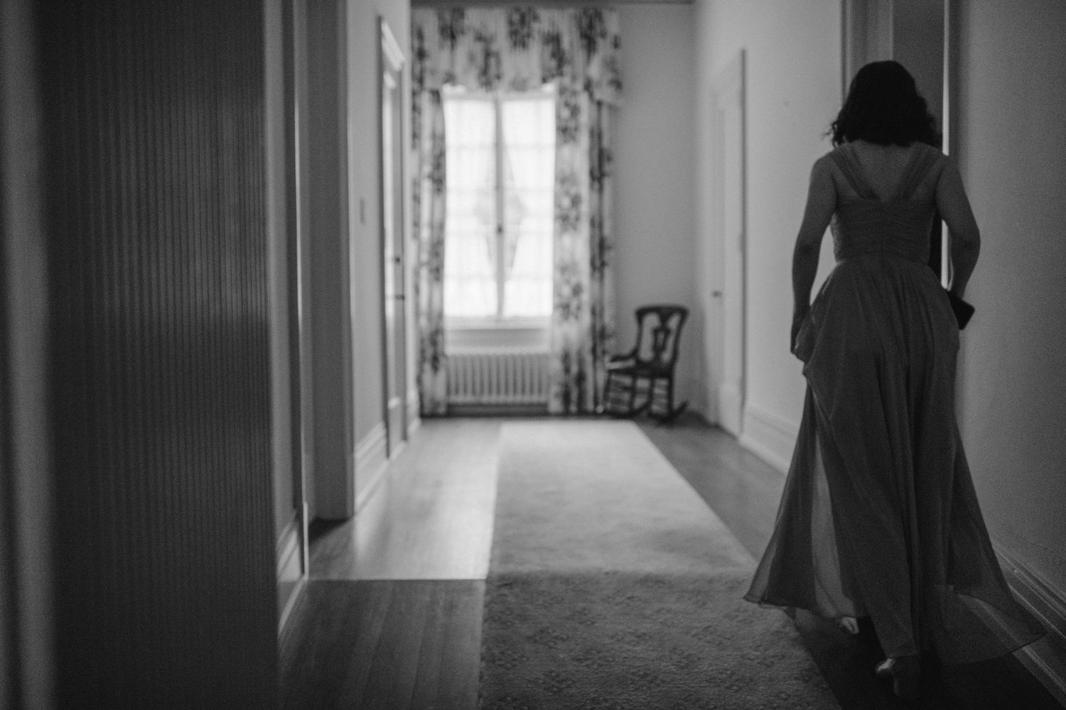 bridesmaid walking down the hall