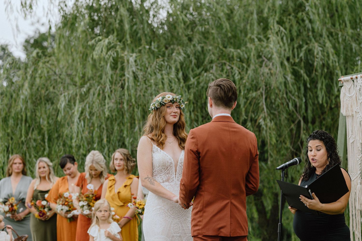 Bride in flower crown during wedding ceremony baltimore wedding photographer