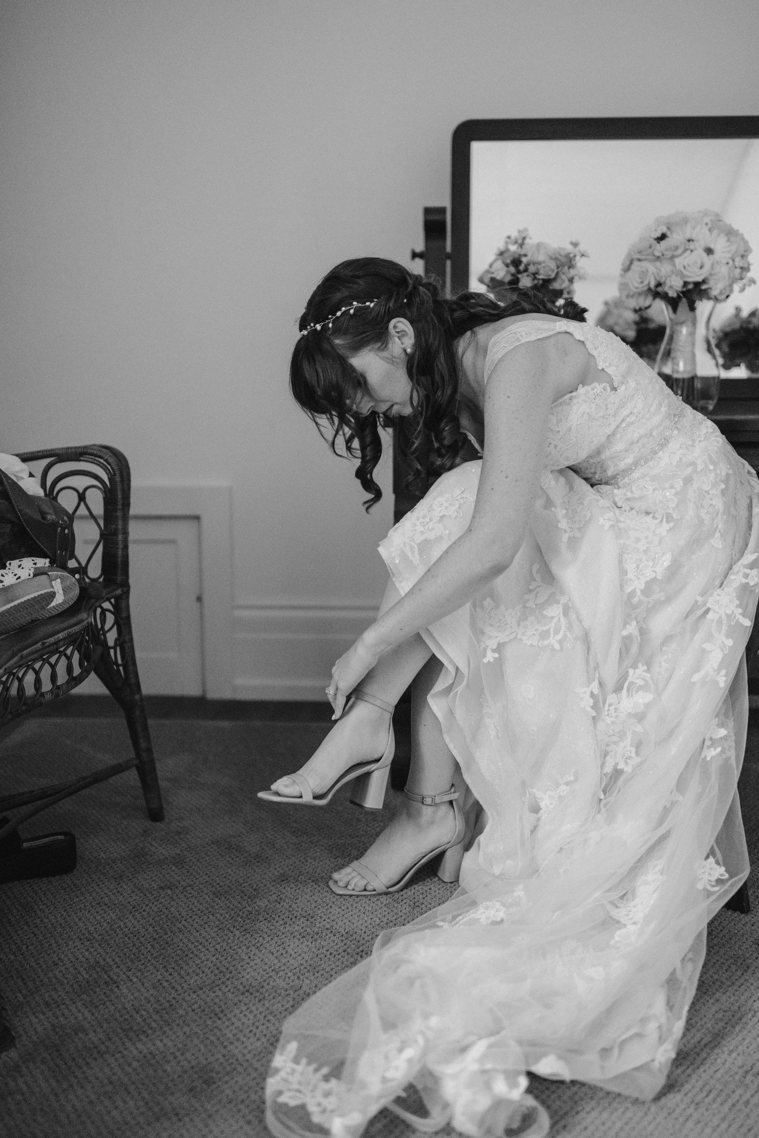 bride putting on shoes