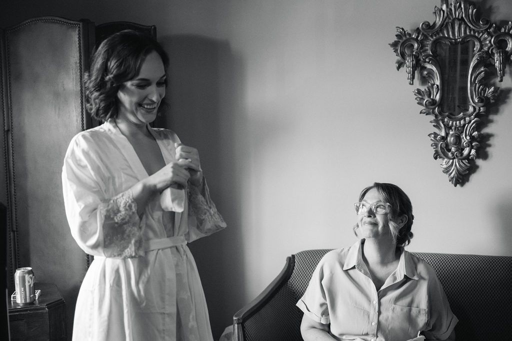 Black and white photo series showing wedding preparation moments with bride and bridesmaids getting ready.