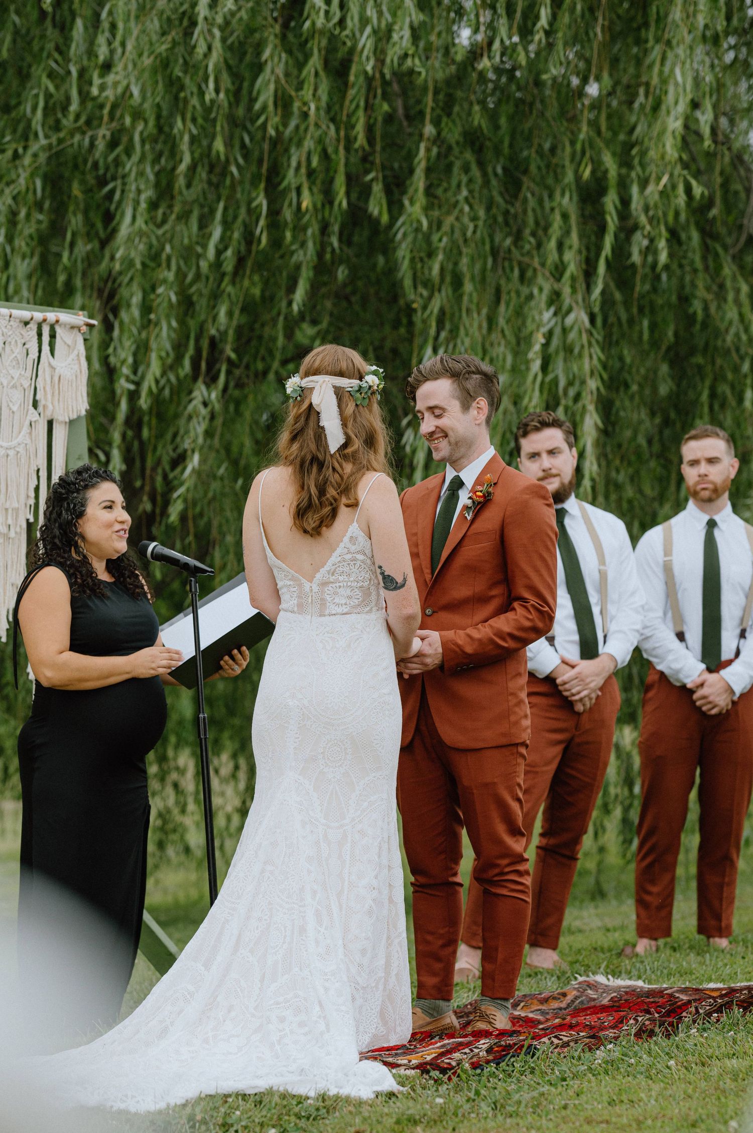 groom at altar backyard wedding maryland documentary wedding photographer