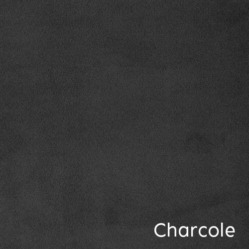 Charcoal text appears in white against a dark black background creating stark contrast.