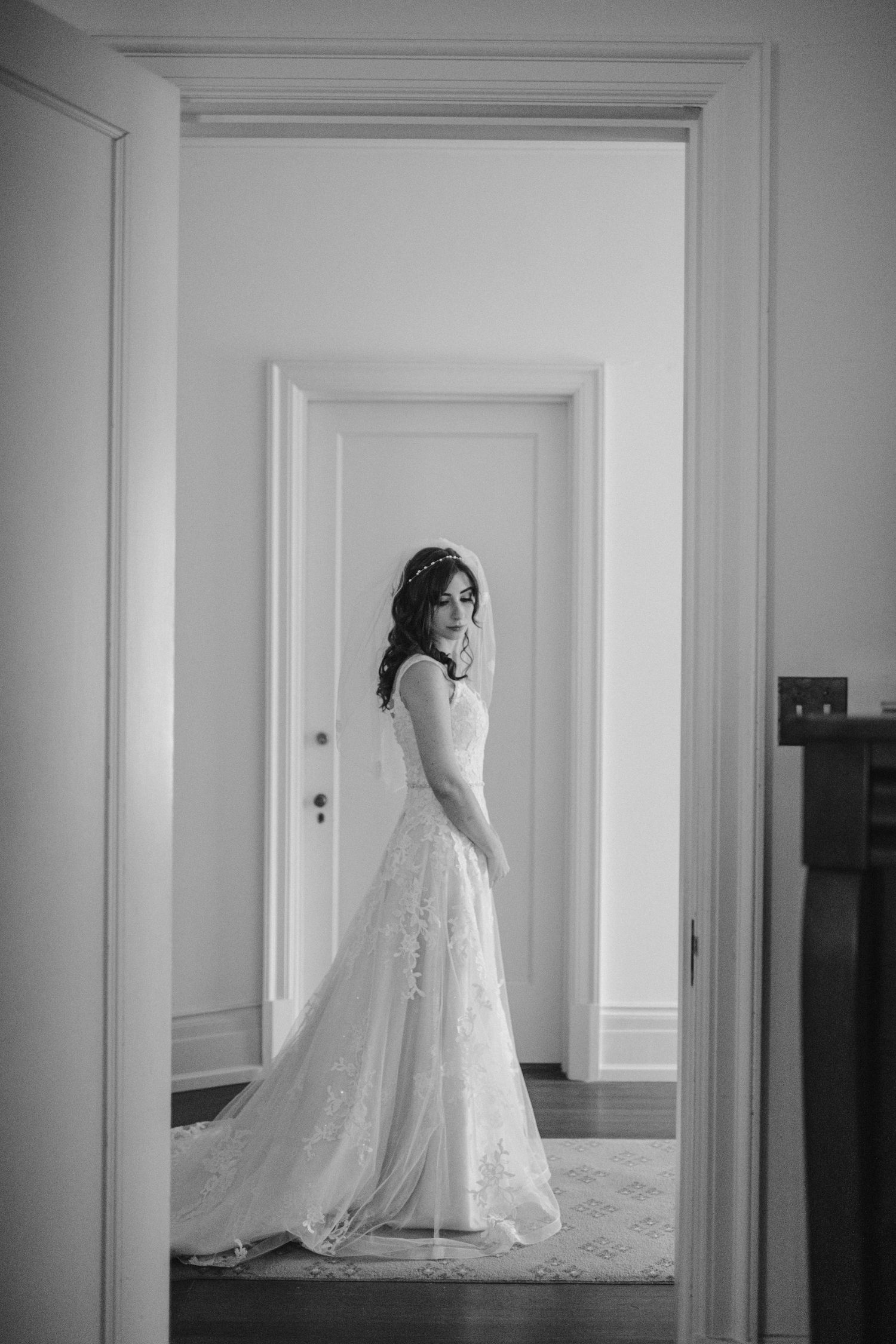 inside strong mansion bride through doorway