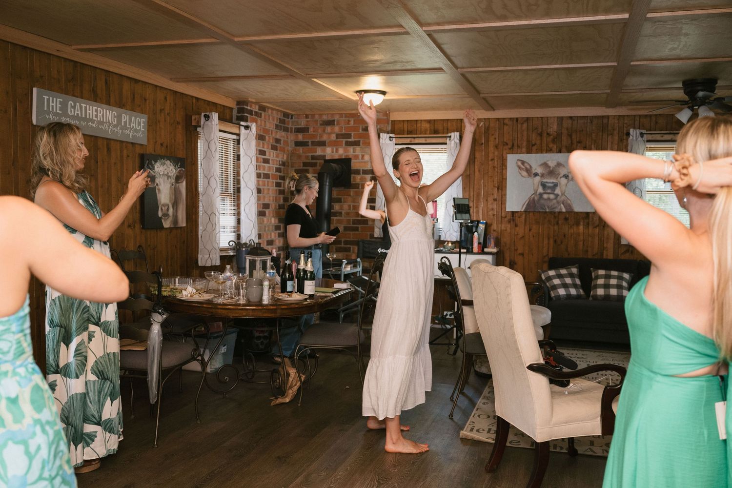 bride celebrates with bridesmaids