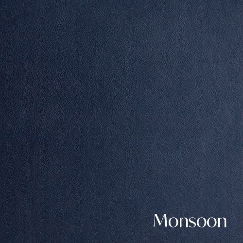 Navy blue leather material with a smooth finish and subtle natural grain.
