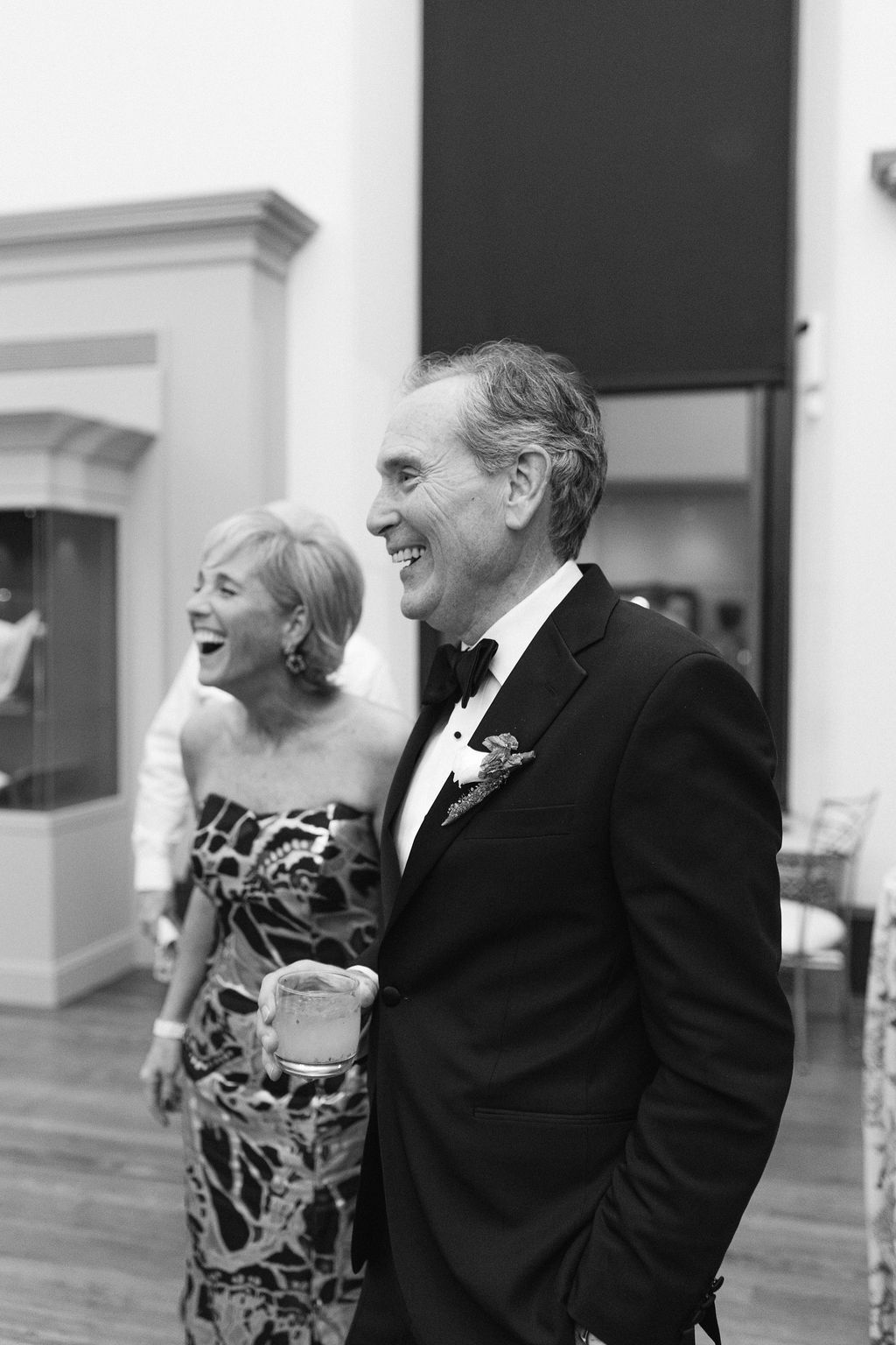 Elegant couple sharing a joyful moment at a formal event at George Peabody Library Wedding in Baltimore