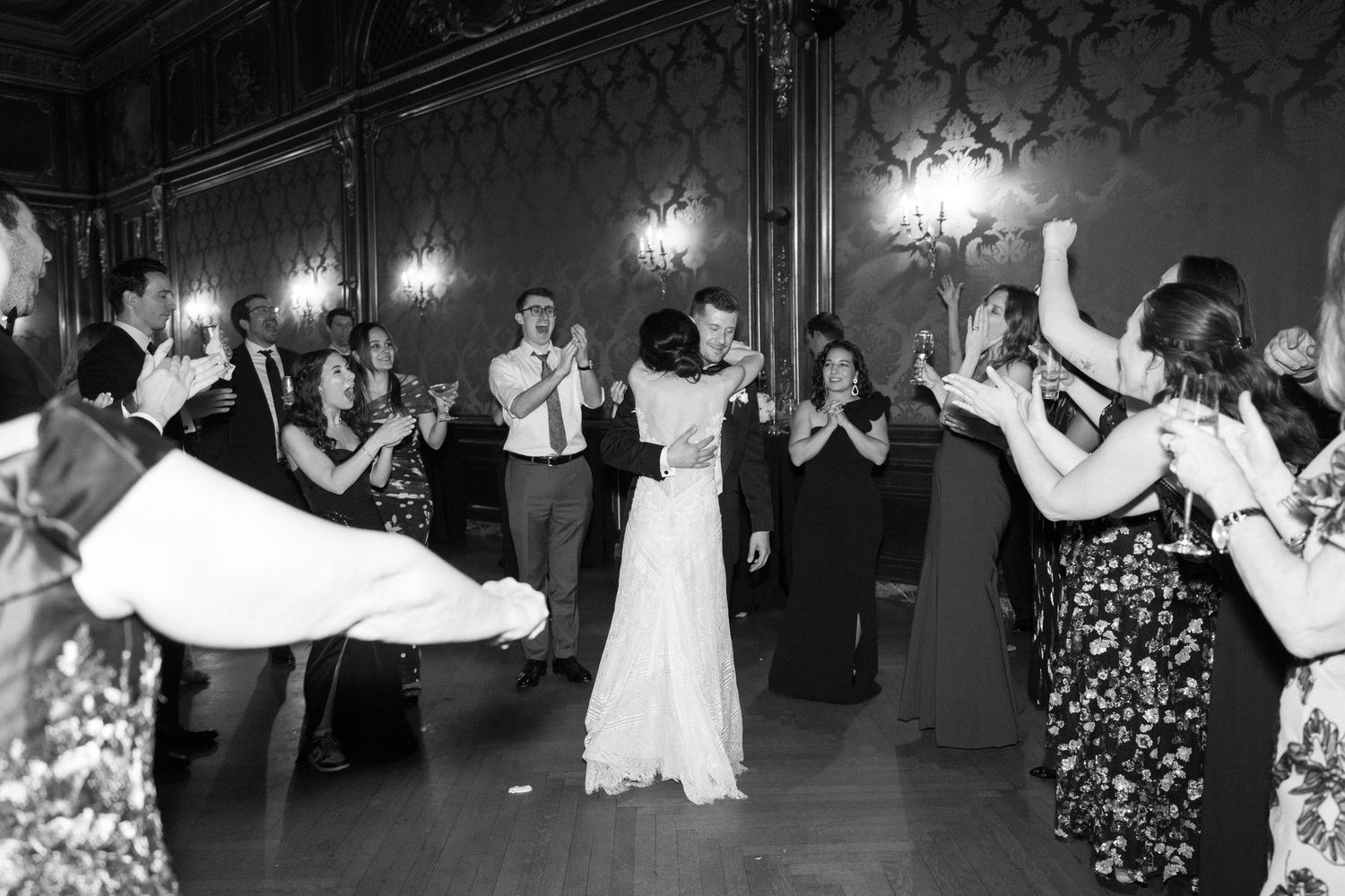 Black and white photo of couples dancing and celebrating at an elegant wedding reception at baltimore engineers club wedding