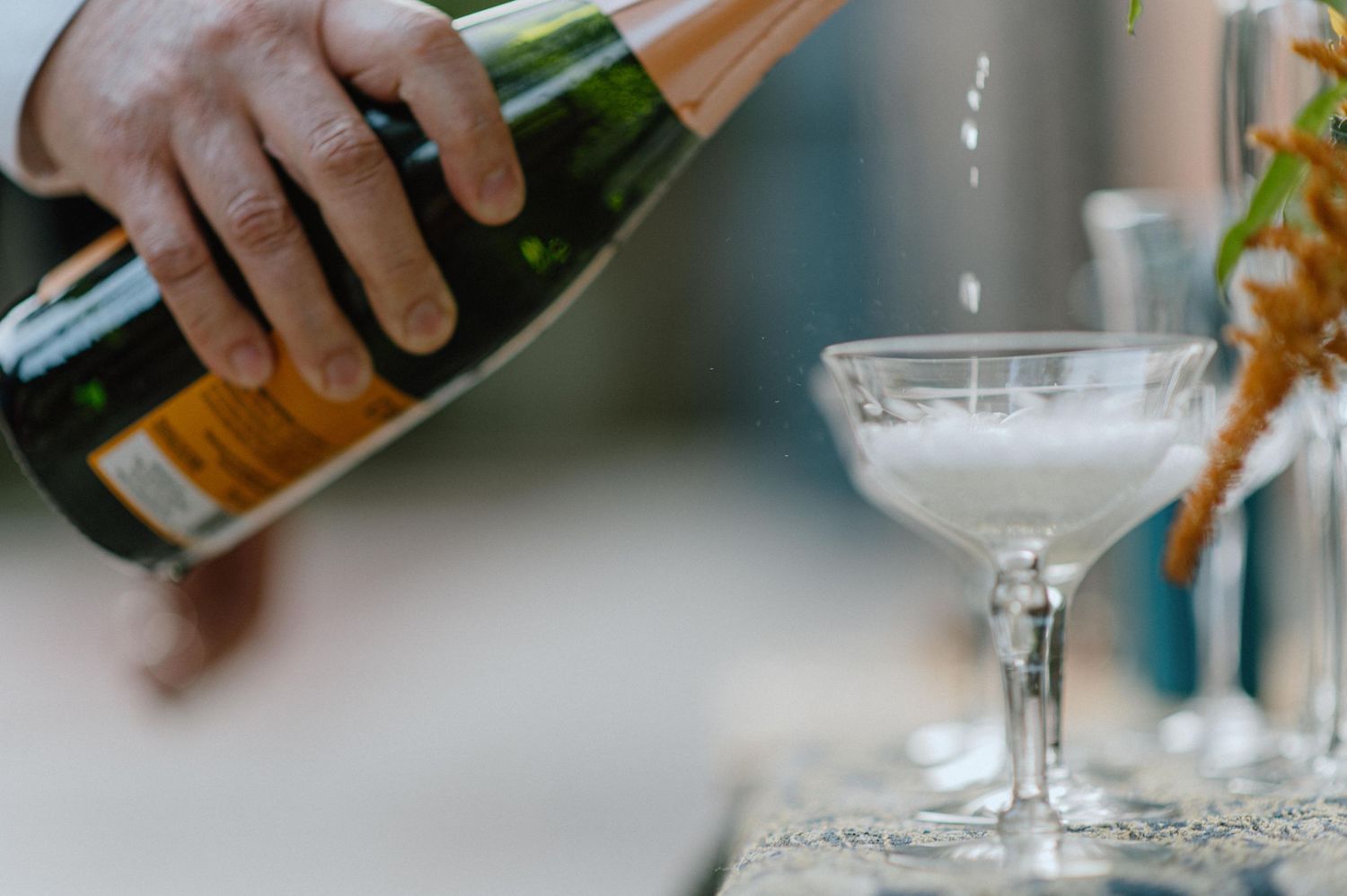 champagne being poured into glass