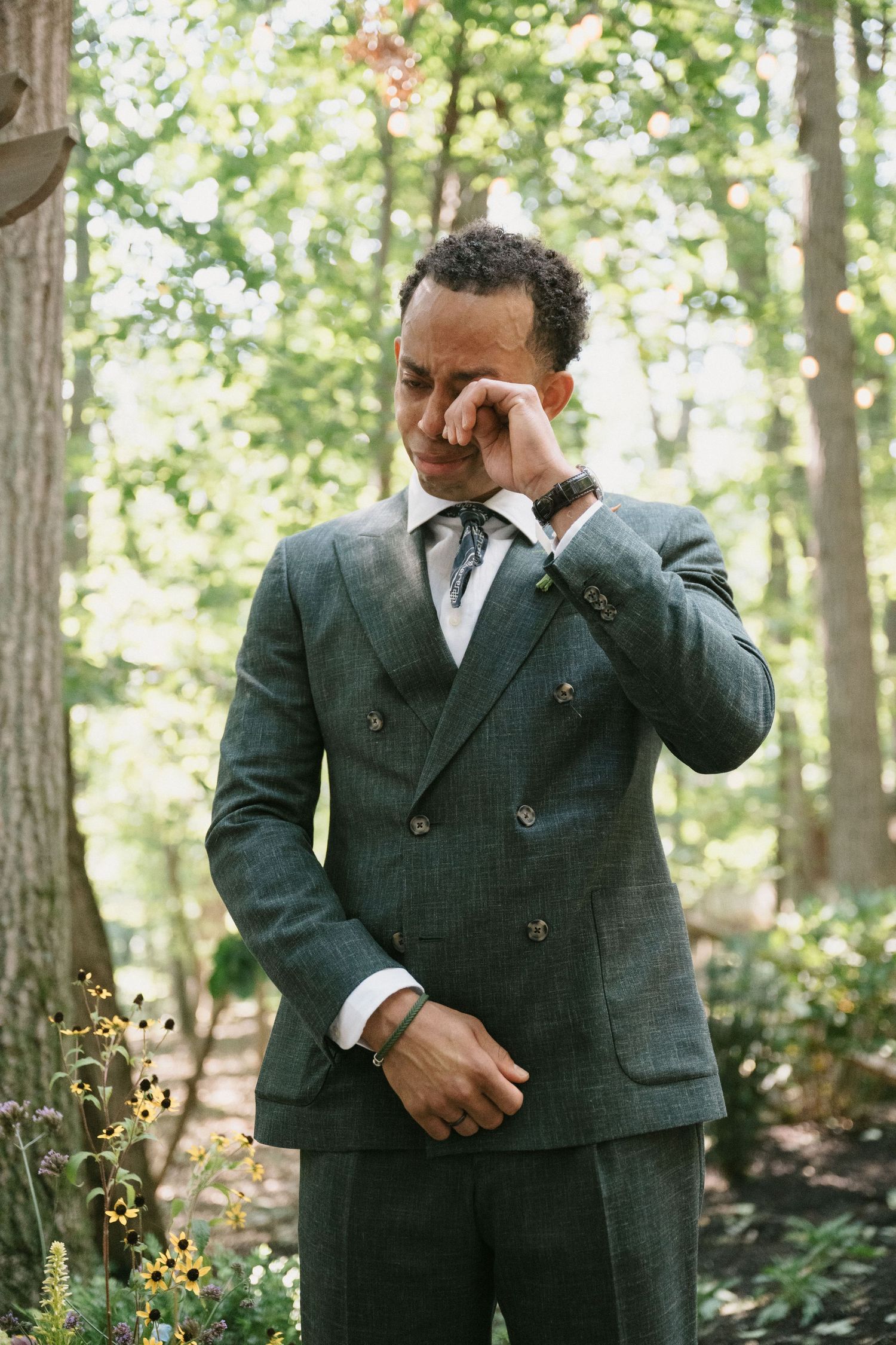 groom cries after seeing the bride