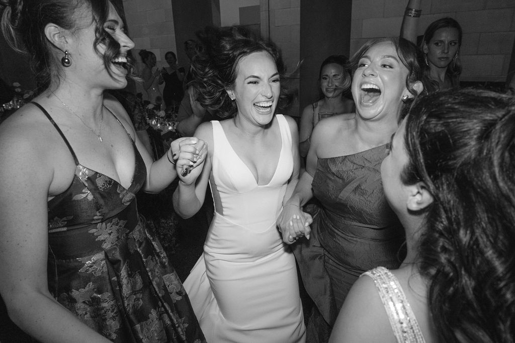 Black and white candid photos show joyful laughter and celebration at a party or gathering.