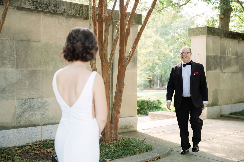A sequence of wedding photos showing a couple walking through a garden pathway with sunlit trees and stone walls.