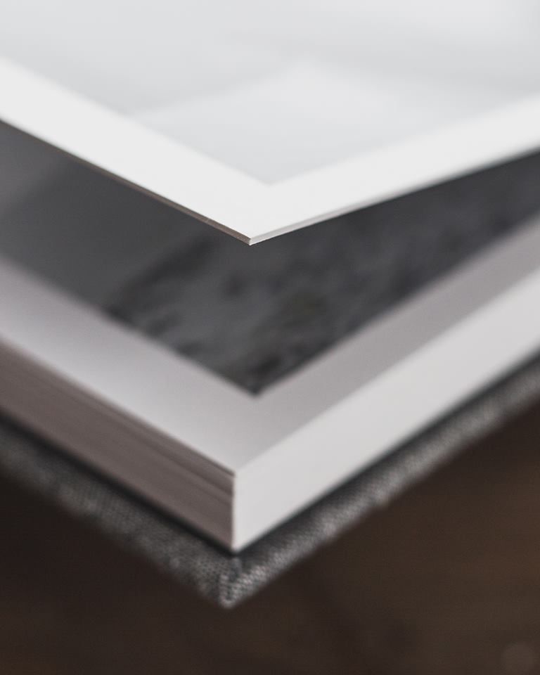 Close-up of white paper edge showing layered thickness.