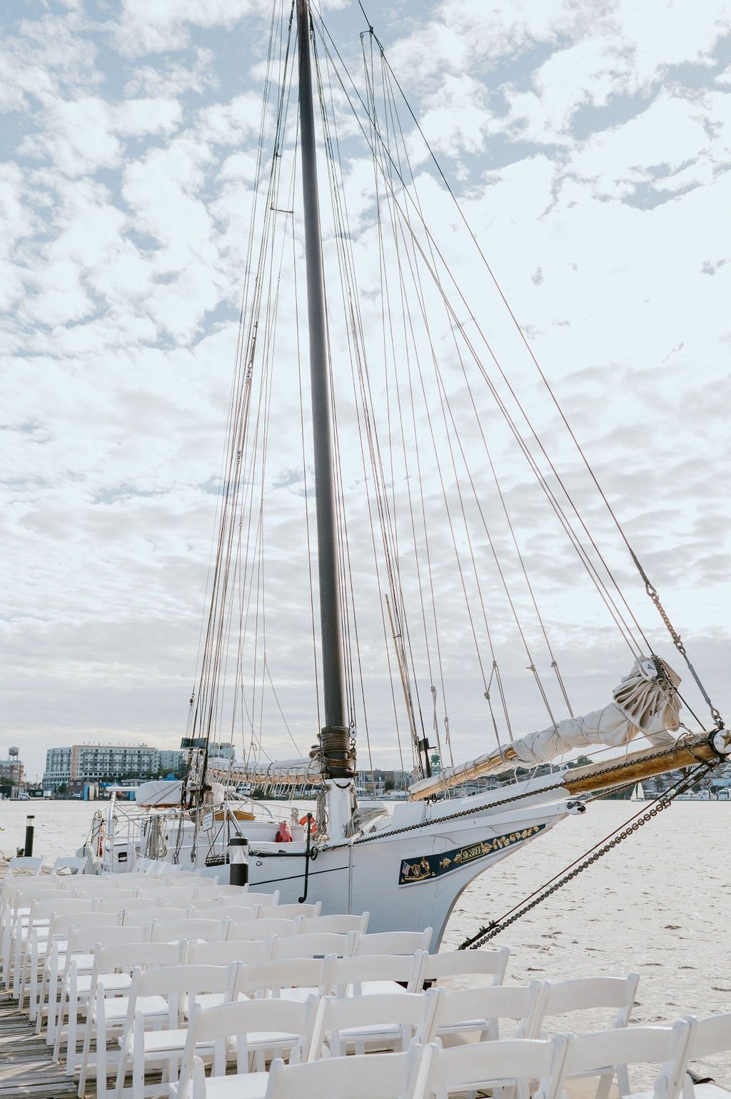 ceremony set up with boat in background at the frederick douglas maritime museum