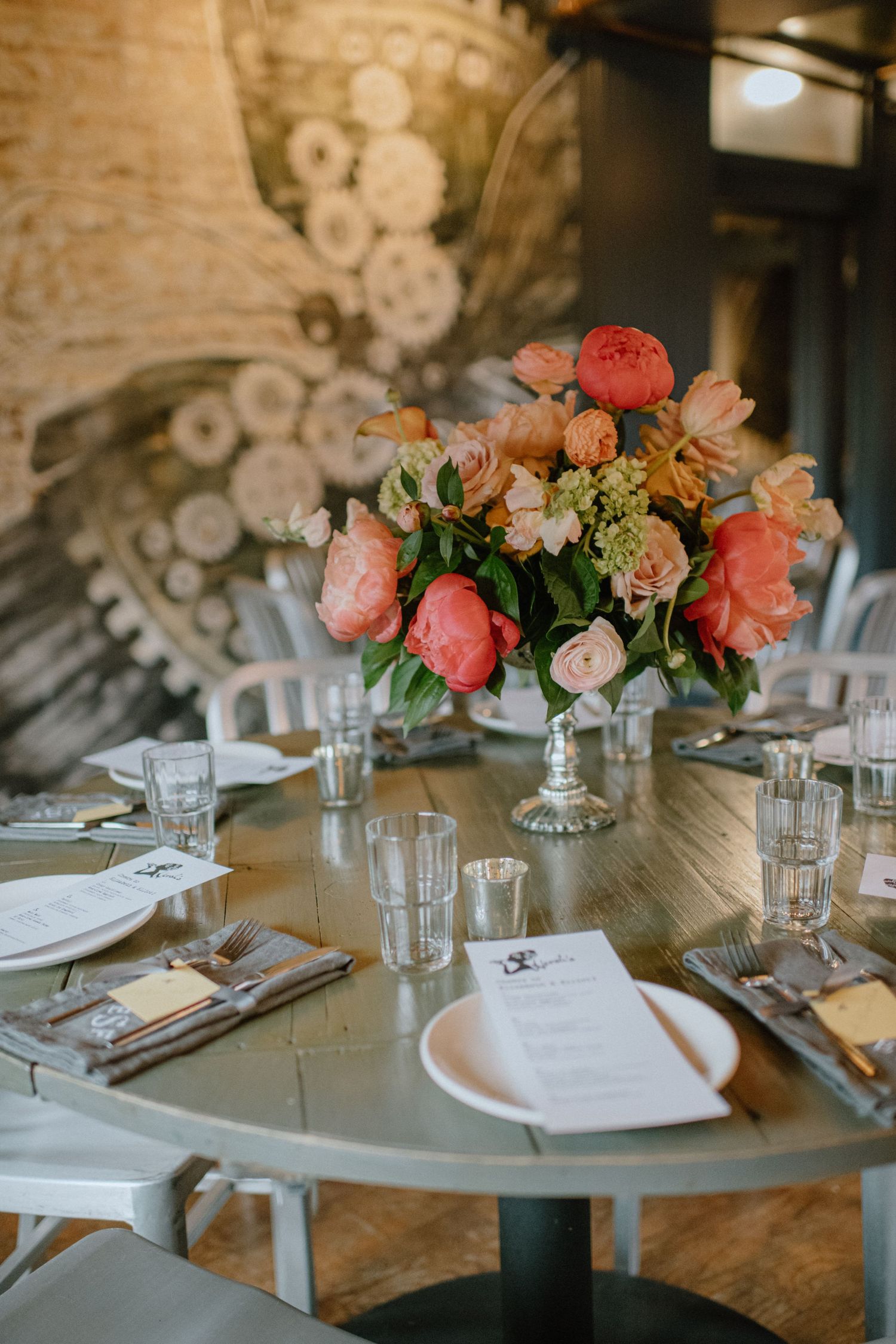 table decorated with florals for wedding reception at Hersh's