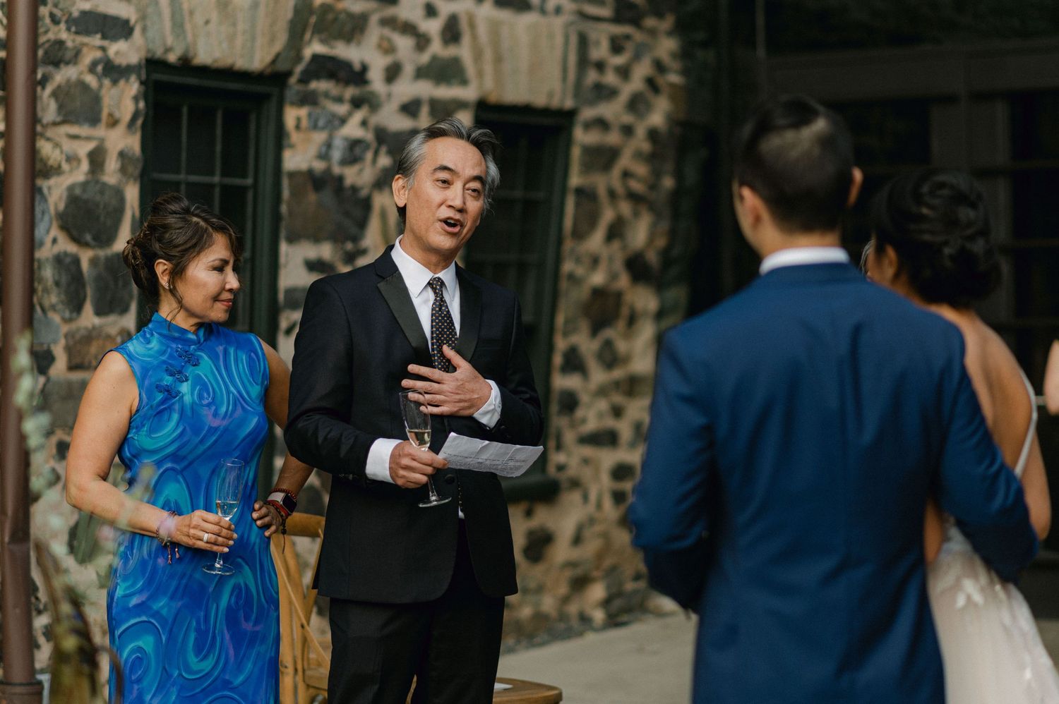 dad gives toast after wedding ceremony