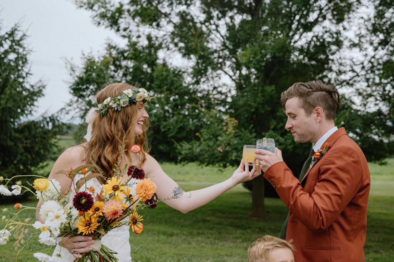 candid image of bride and groom having a drink backyard wedding maryland documentary wedding photographer