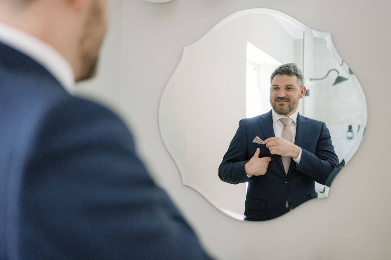 groom looks in window