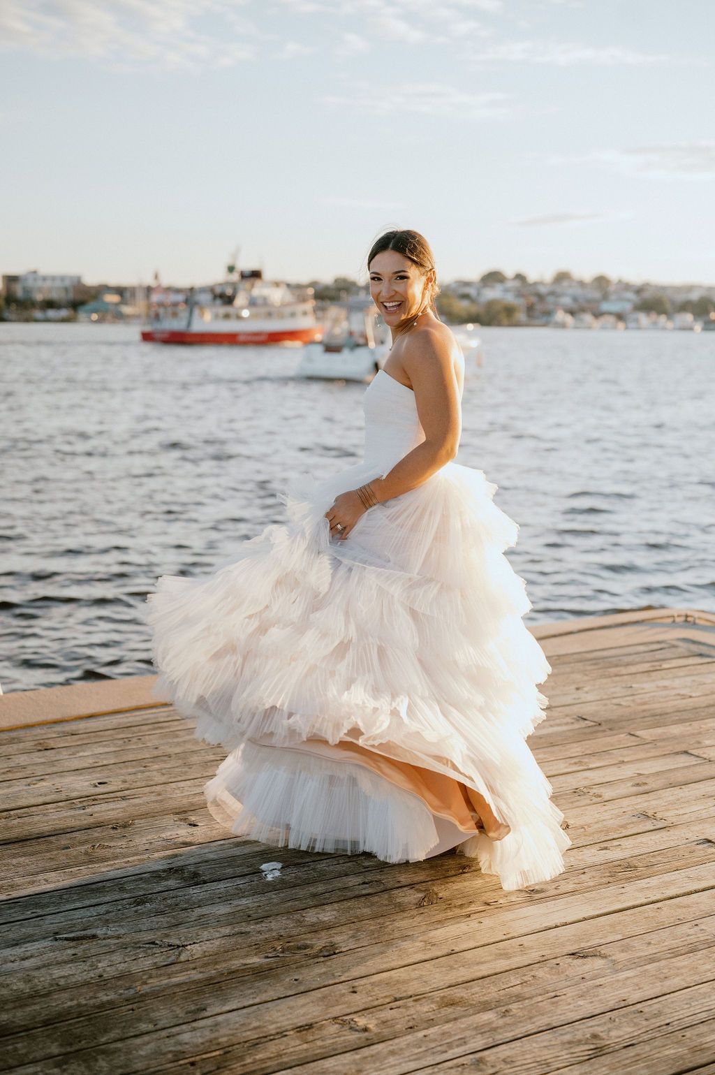 bride spins by the inner harbor outside the frederick douglas maritime museum