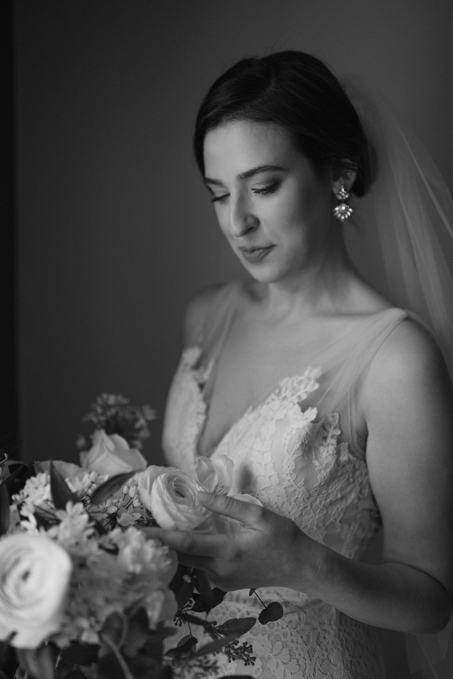 Classic black and white bridal portrait with delicate lace details.
