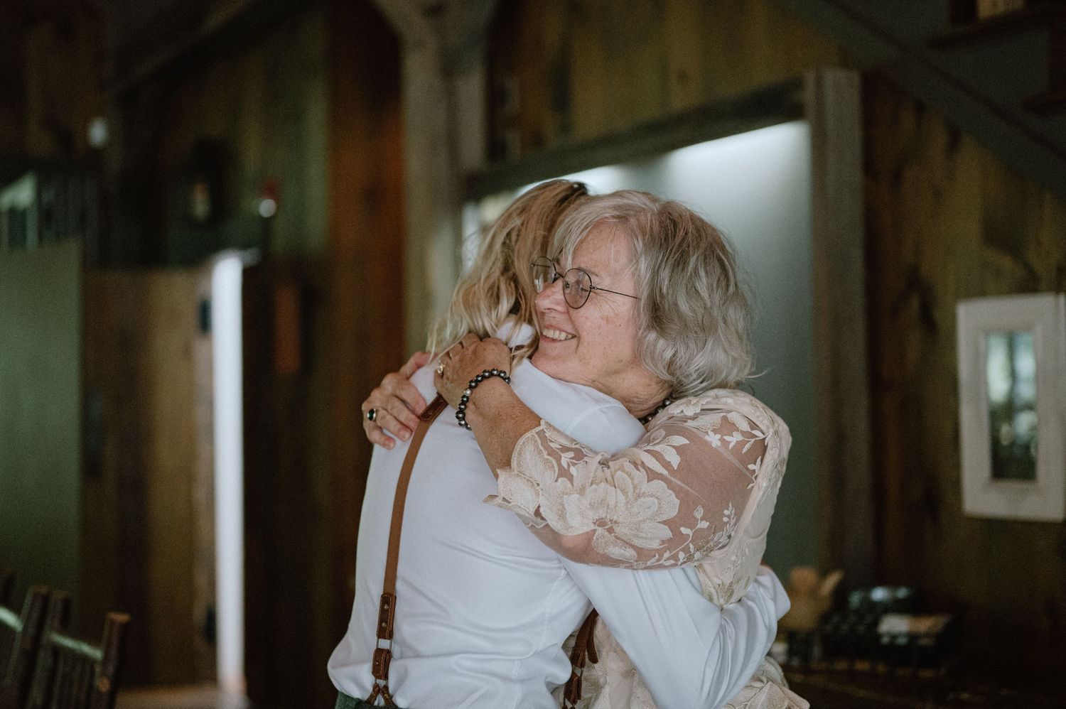 mother hugging daughter