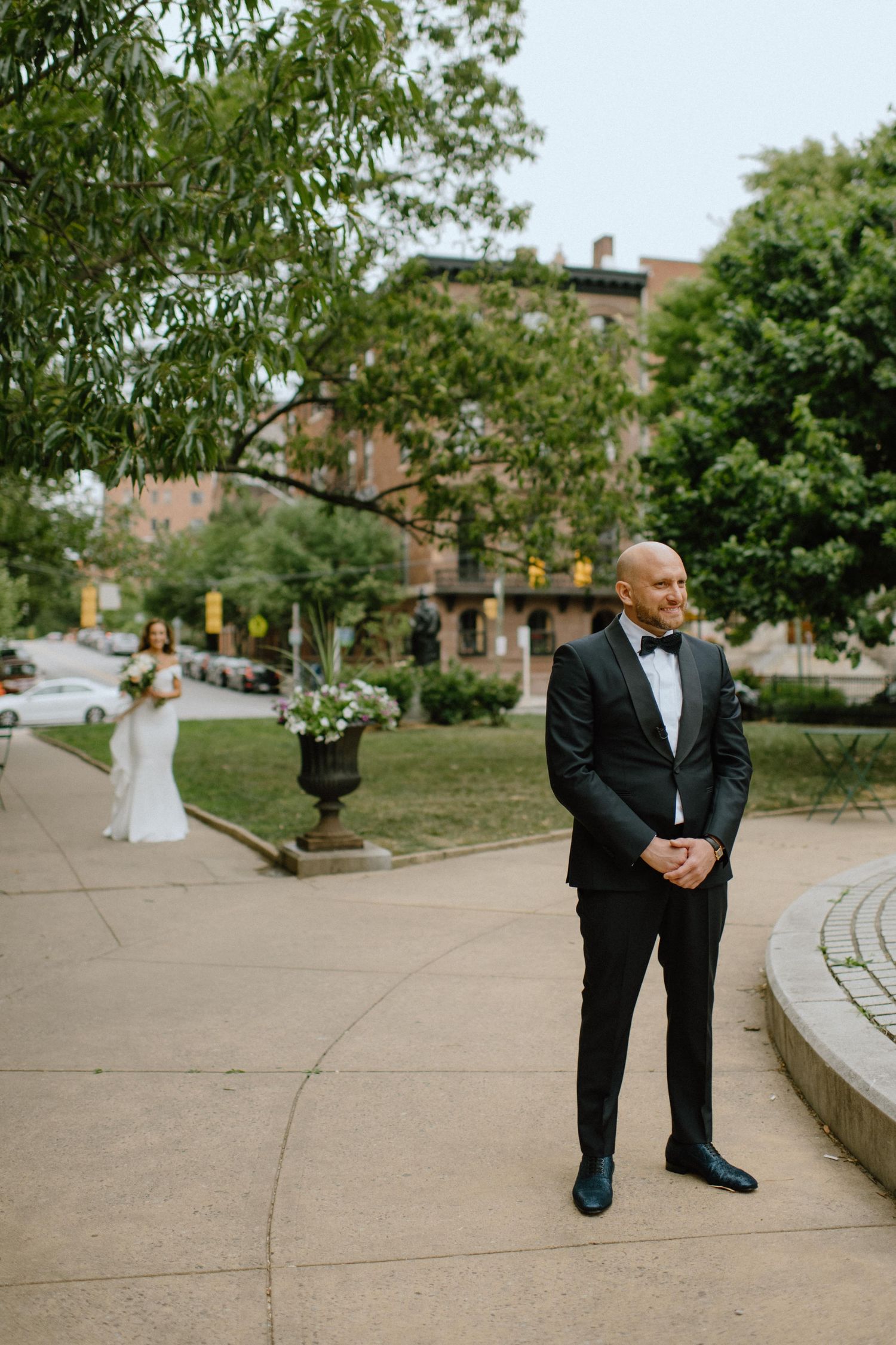 groom waits for bride to see her for the first time