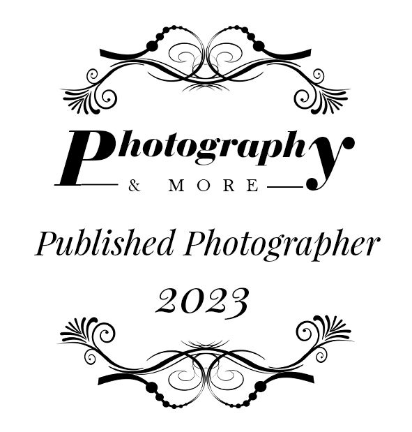 Decorative black logo for Photography & More with ornate flourishes and Published Photographer 2023 text.