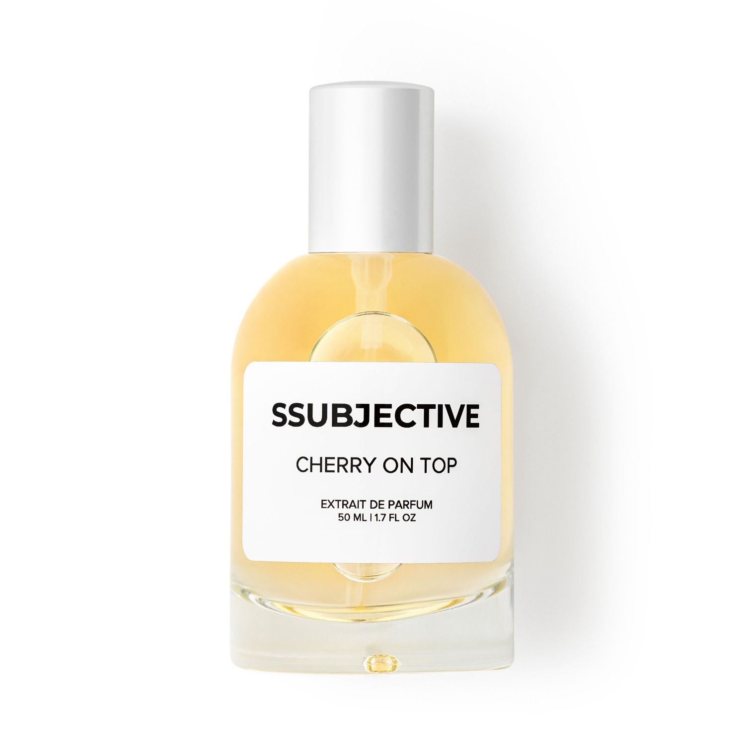 Yellow glass perfume bottle with white cap labeled SSUBJECTIVE Cherry on Top.