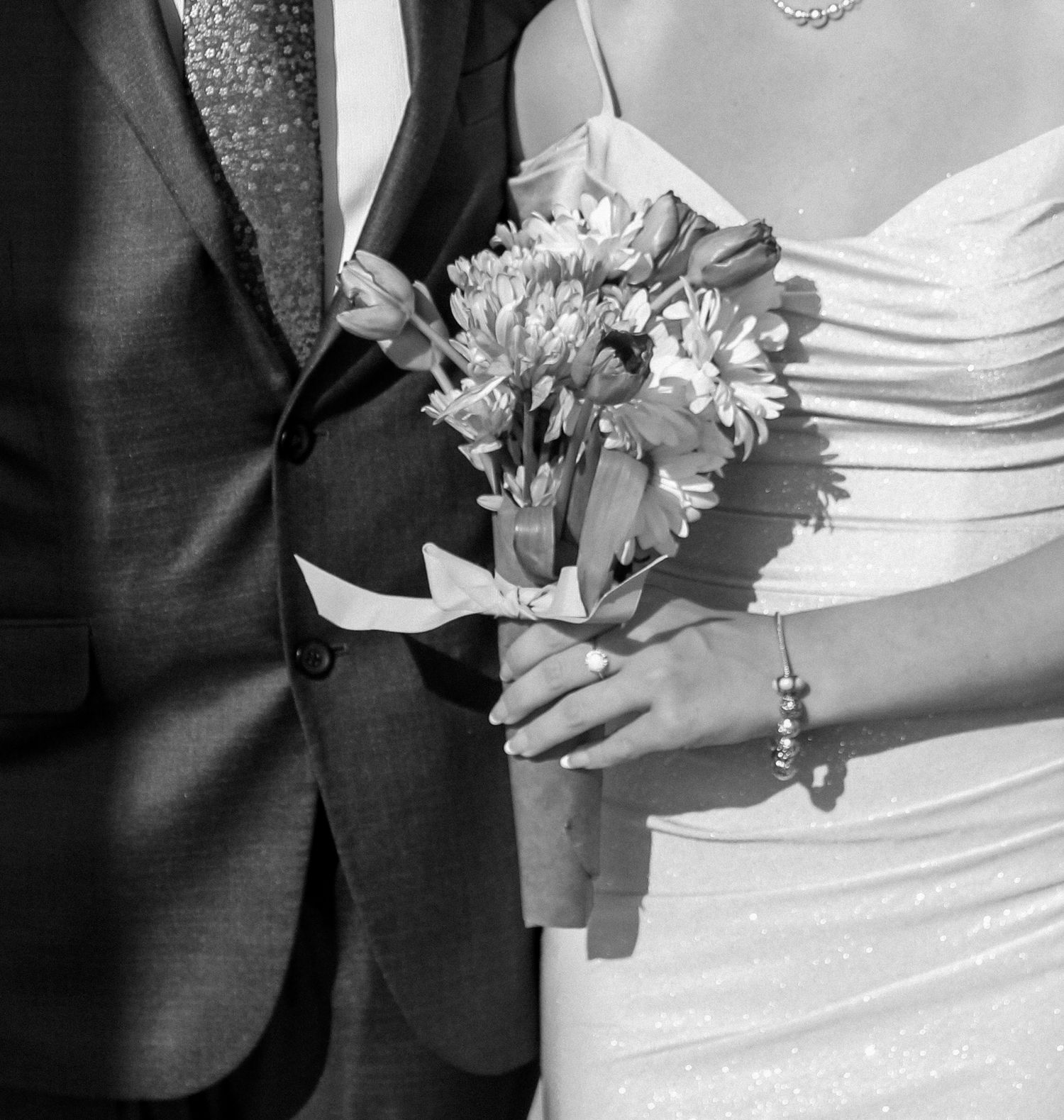 It's all about the details!! The detail shot from Isabella Ramsey's prom photo holding flowers.