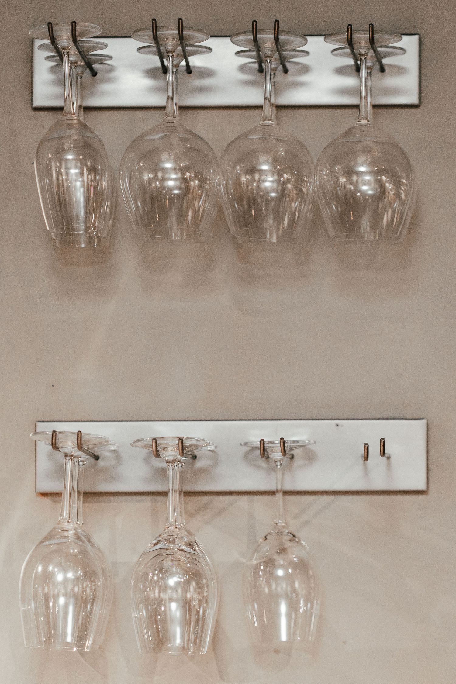 Wine glasses on the rack at Pinocchio, Helsinki bar interior detail