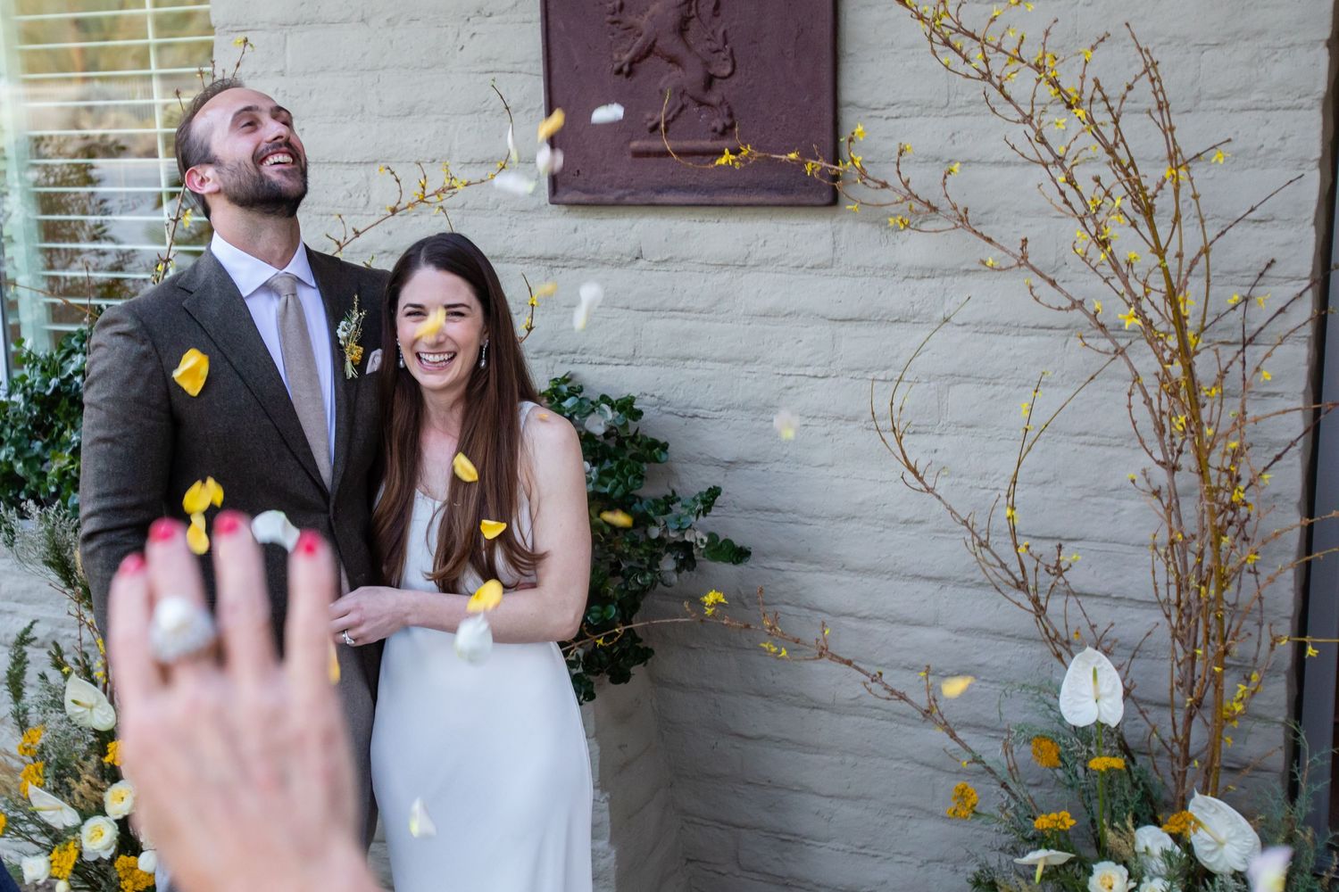 A surprise engagement moment captured in multiple frames with natural outdoor lighting.