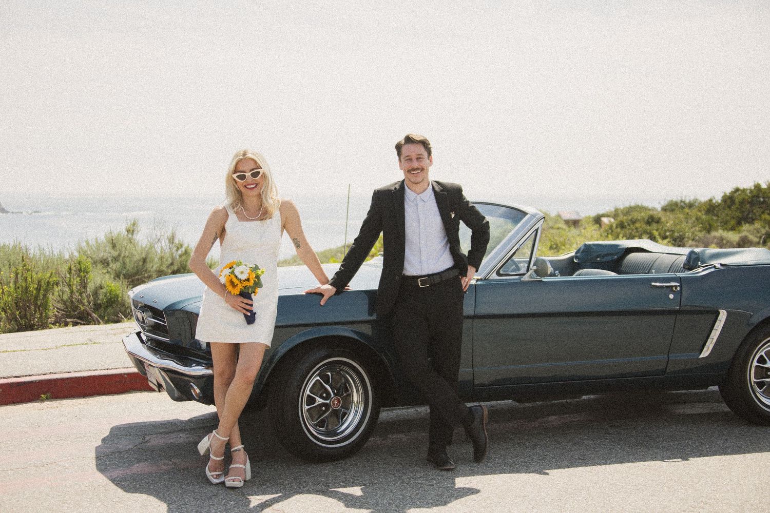 Classic Ford Mustang convertible used for coastal wedding photography.