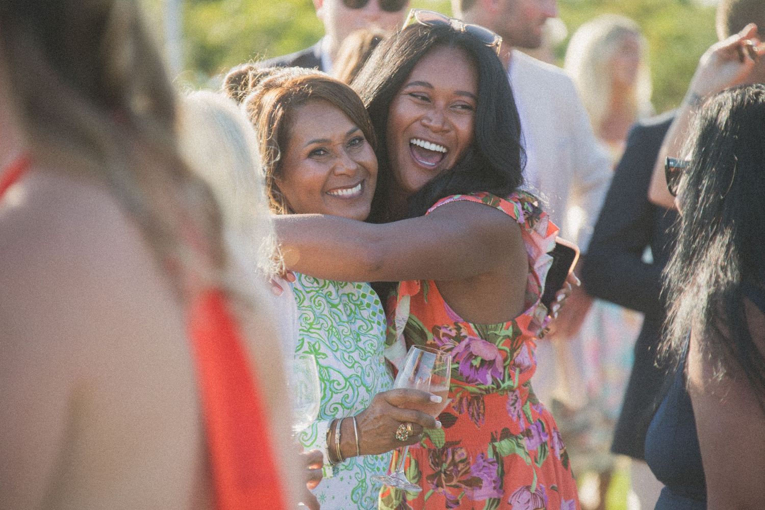 Joyful celebration moment at an outdoor summer event.