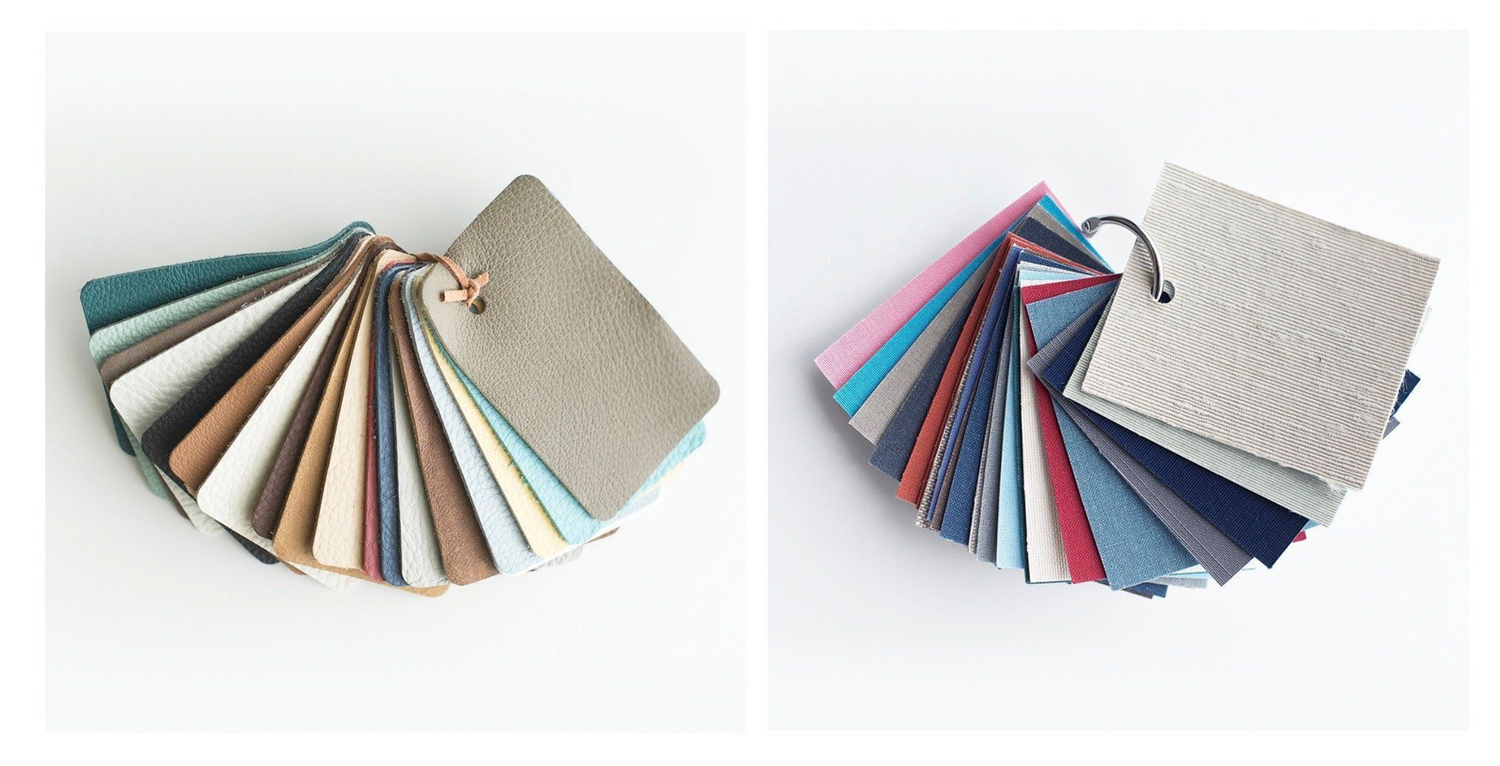 Fabric and material samples arranged in fan patterns showing various colors and finishes.