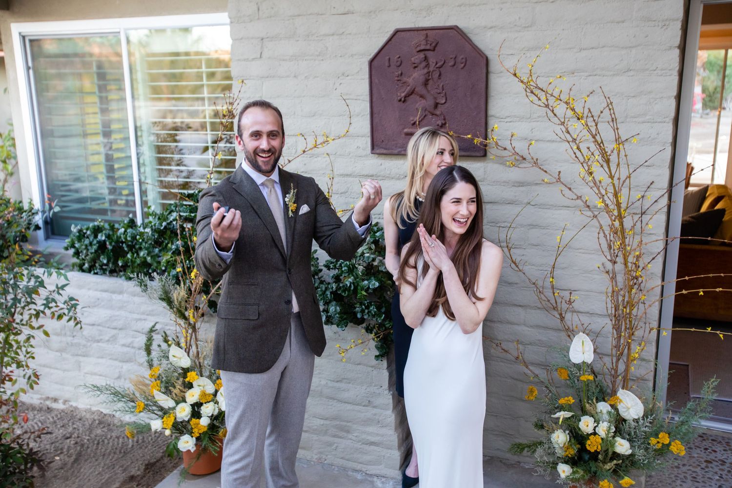 A series of candid reaction shots during a surprise proposal with decorative floral elements.