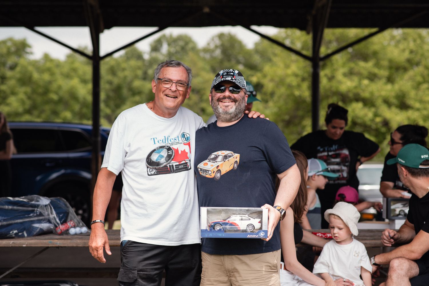 TedFest participant receiving an award during the vintage BMW event.