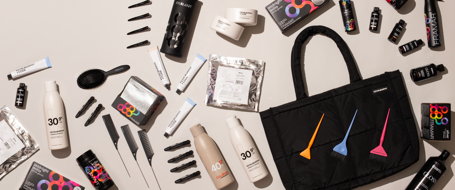 Flat lay product photography featuring Kevin Murphy hair products and Framar tools arranged on a neutral background in a studio setting.