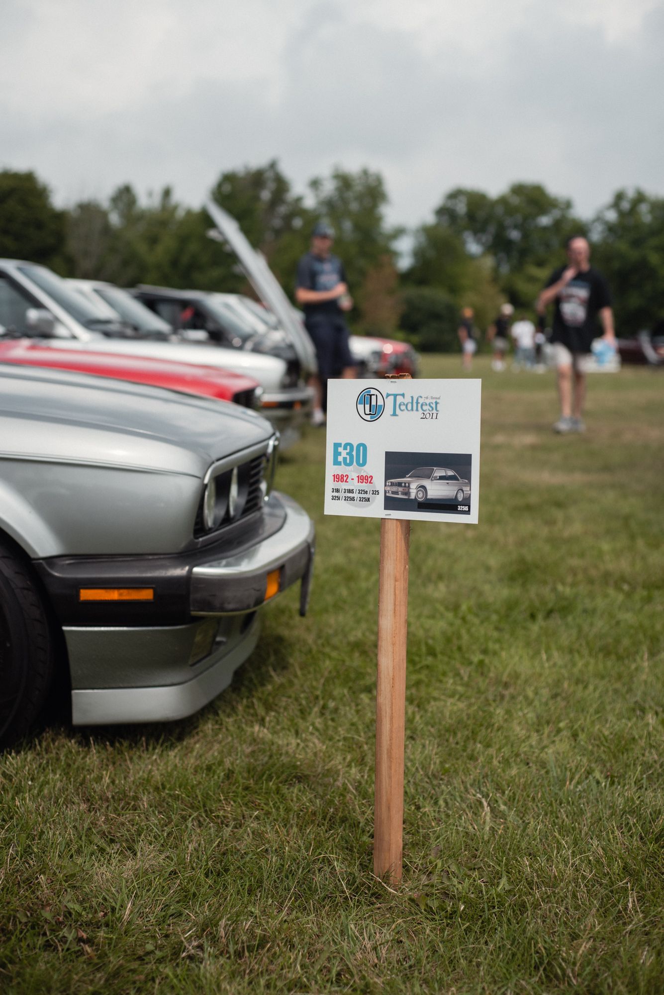 TedFest vehicle display sign beside a classic BMW in Niagara.