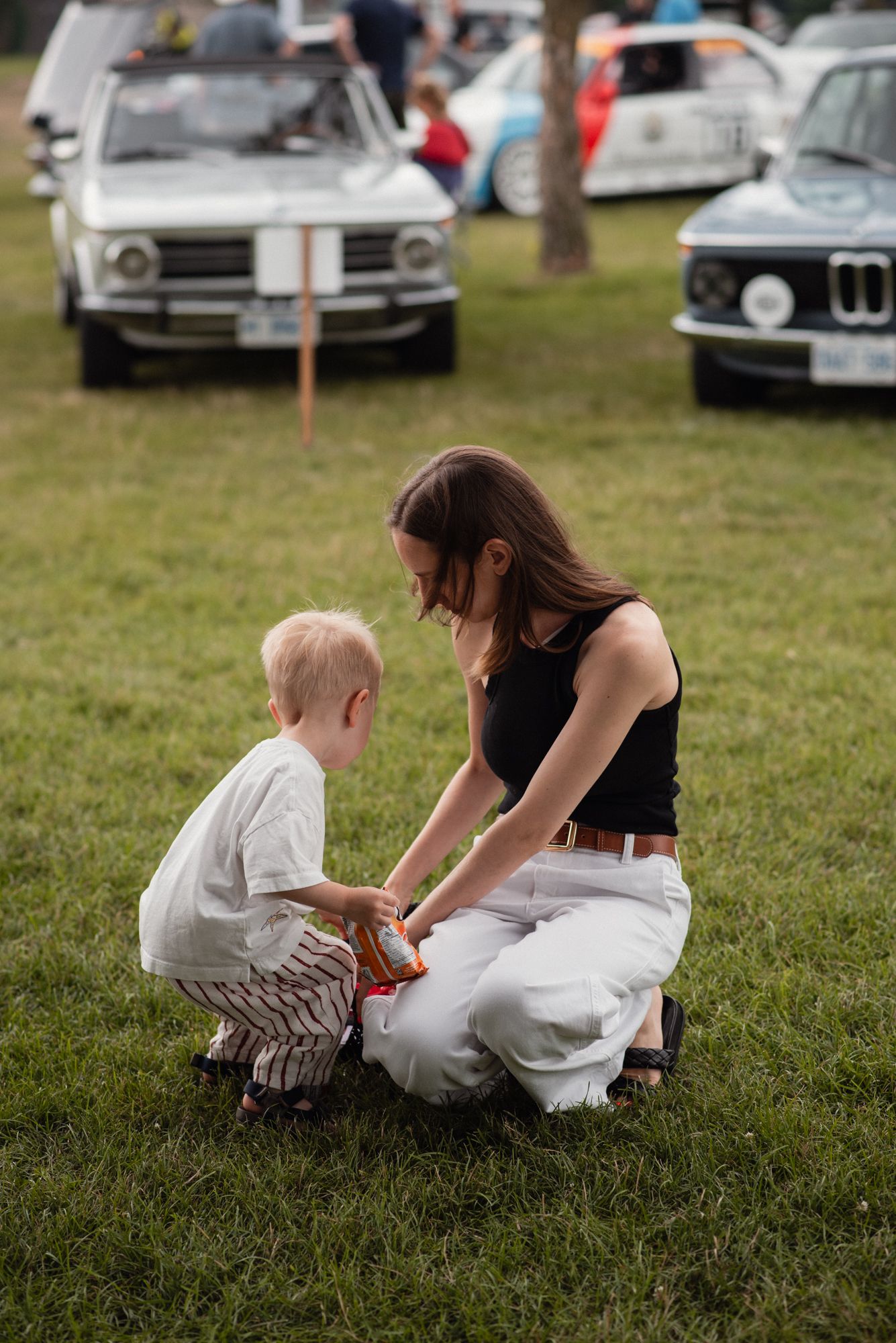 Child and parent enjoying the family-friendly atmosphere at TedFest.