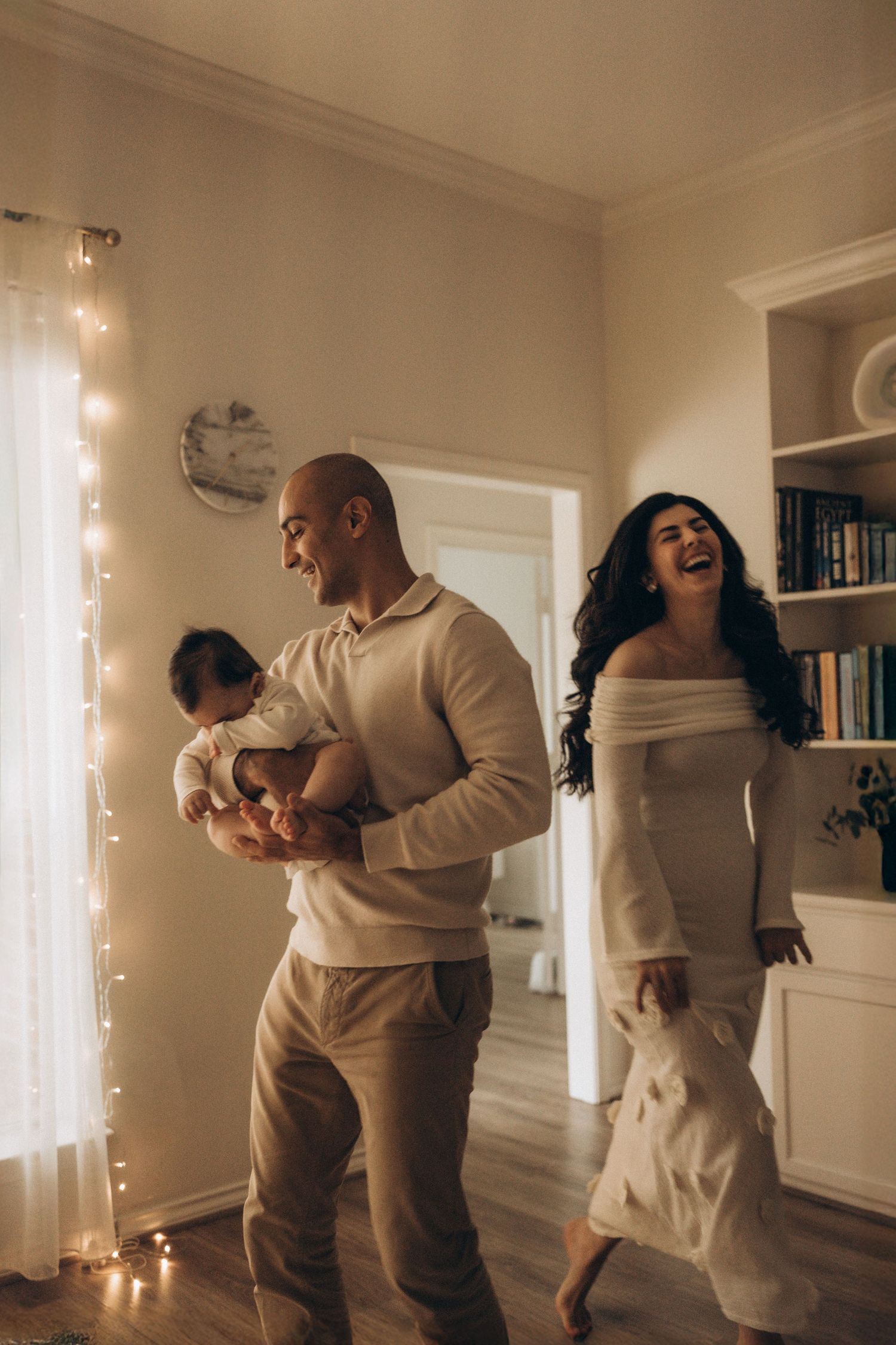 Lifestyle family session at home with warm window light Houston photographer