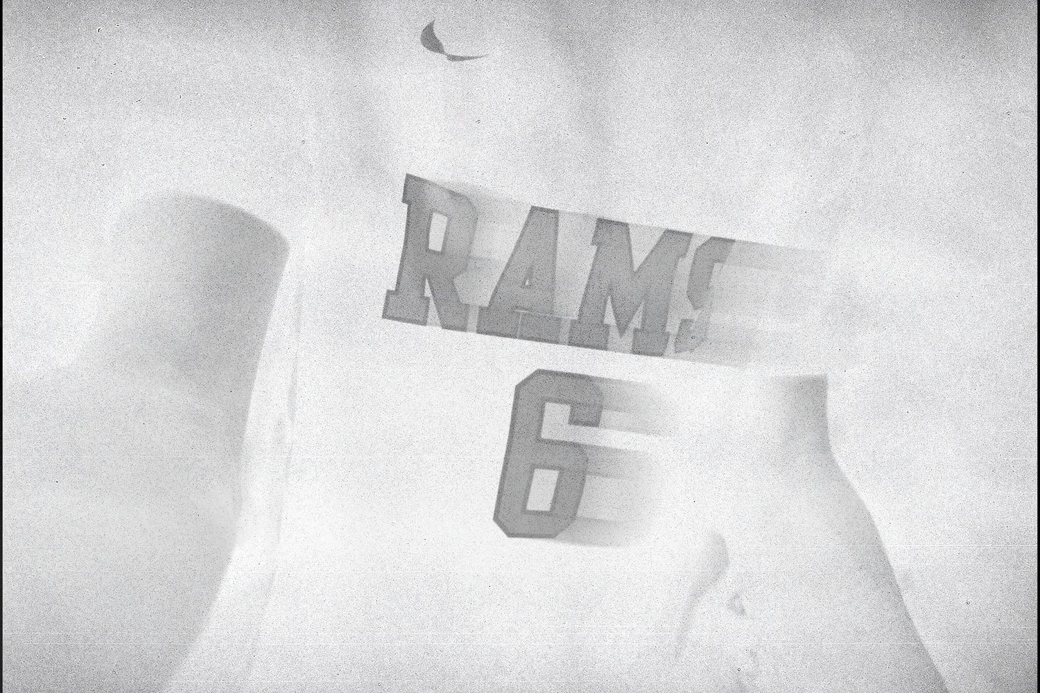 Artistic black and white sports branding design elements with text overlay.