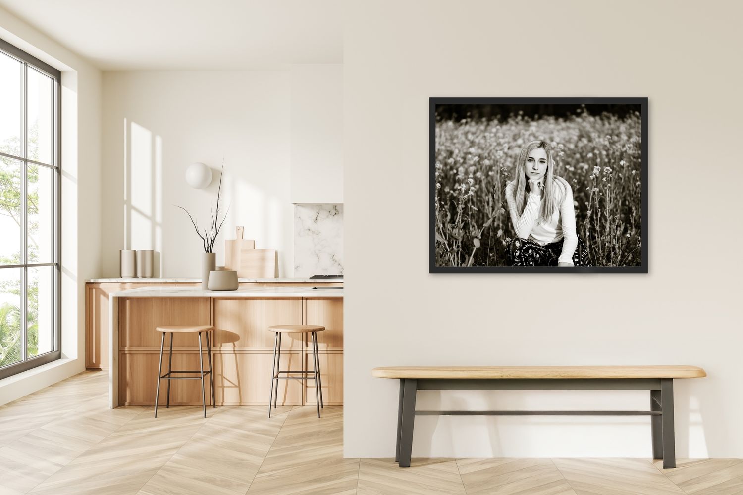 Modern minimalist interior with white walls, wooden floors and black artwork.