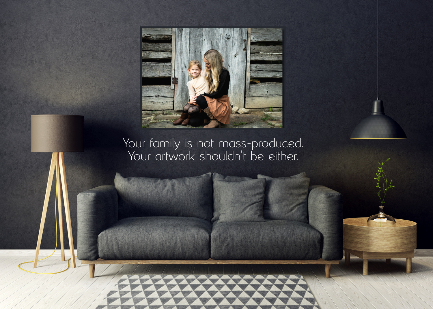 Modern living room interior with dark walls and contemporary furniture featuring artwork of a mother and daughter.