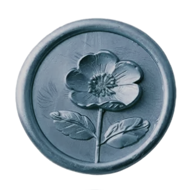 Dusty blue wax seal stamp featuring an embossed wildflower with leaves.