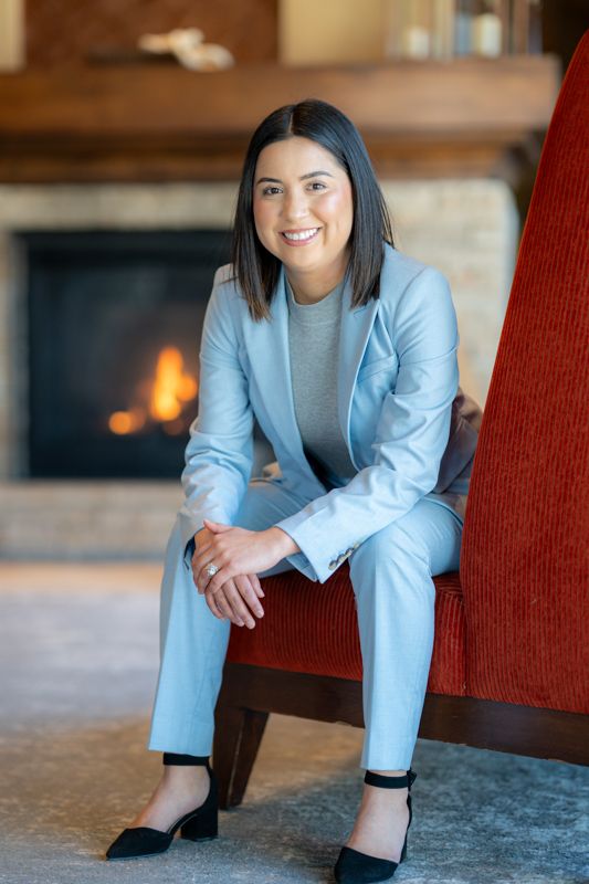 Professional branding portrait of a businesswoman in a modern interior captured during a personal branding photography session.