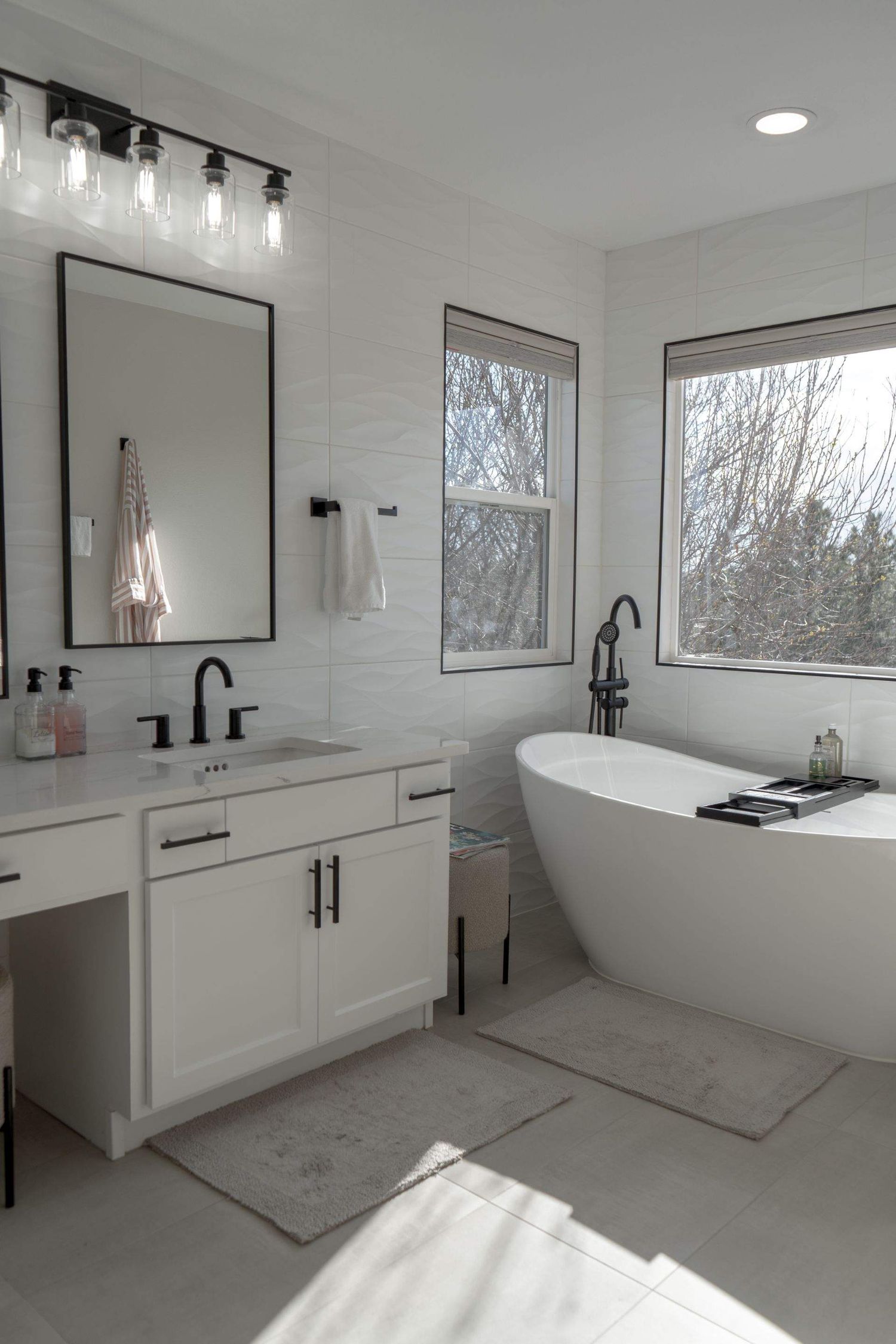 Bright modern bathroom interior photographed for a home listing by a Colorado real estate and interior photographer.