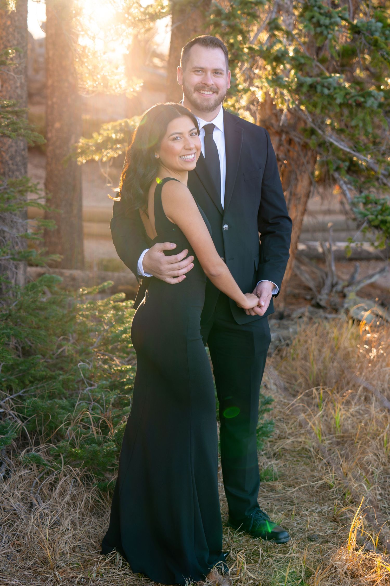 Couple portrait at golden hour during a romantic engagement photography session captured by a Colorado couples photographer.