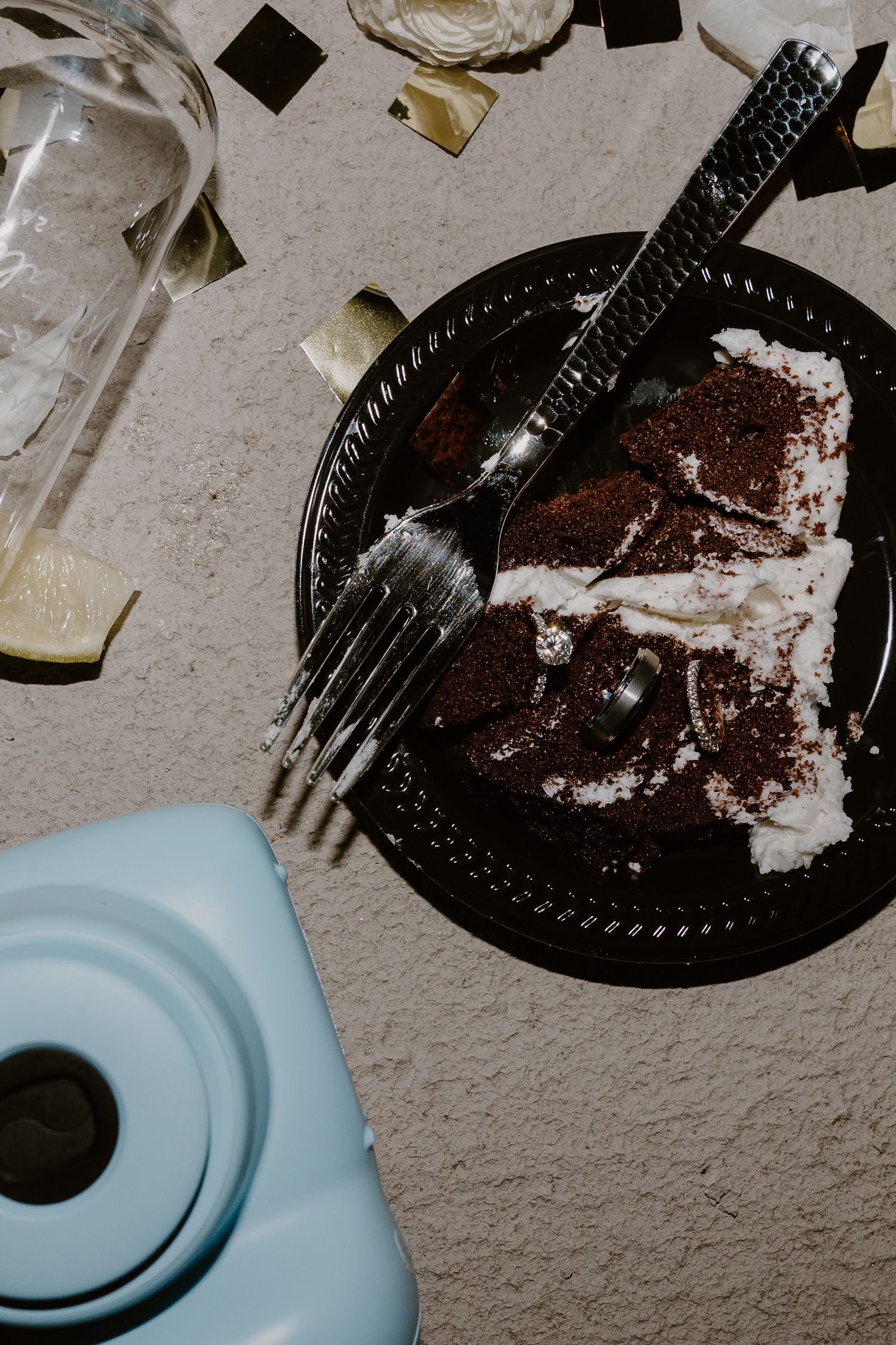 A sequence of photos showing chocolate cake being eaten with a fork on a black disposable plate.