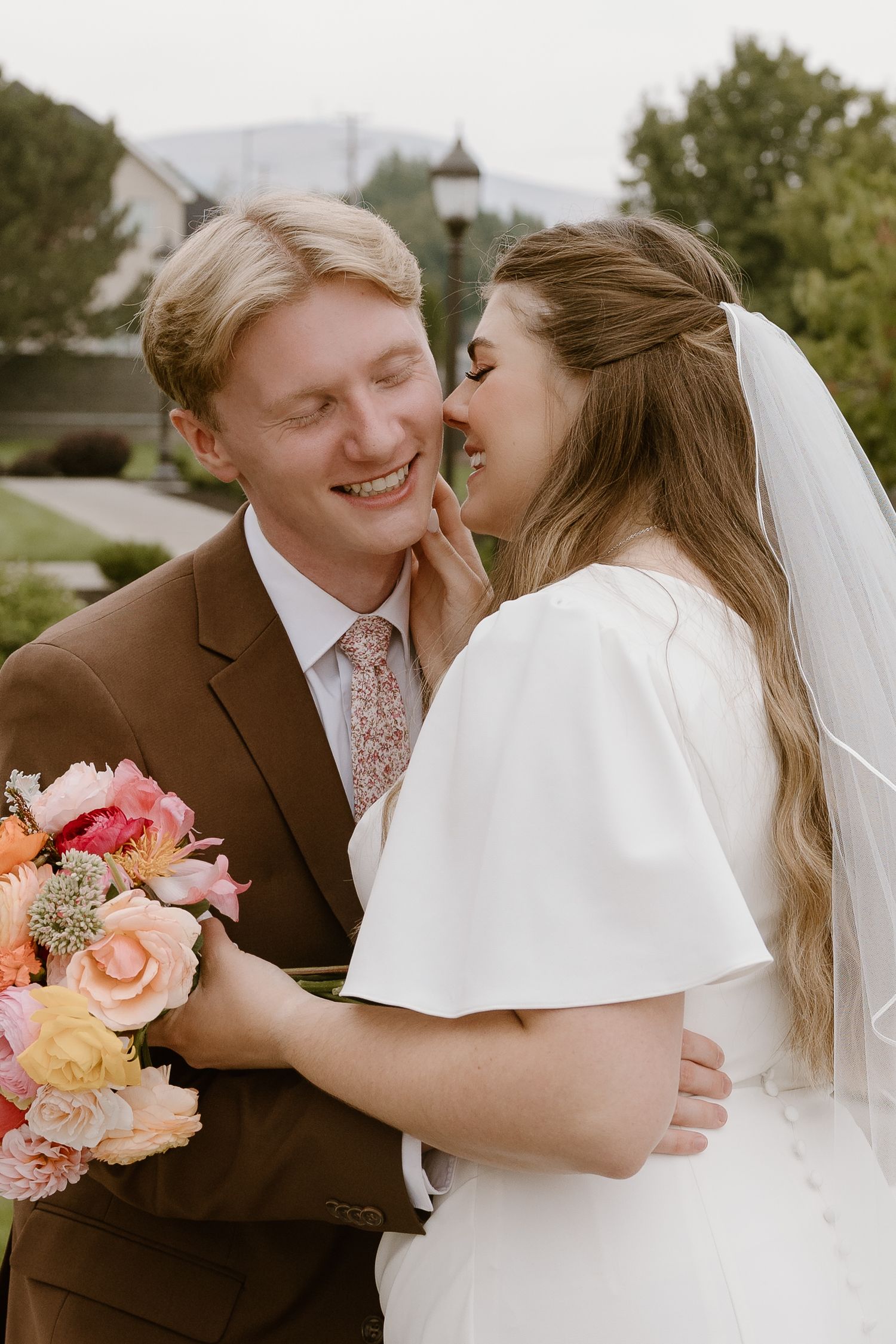 A romantic wedding photo sequence showing tender moments between newlyweds with peach and pink floral bouquet.