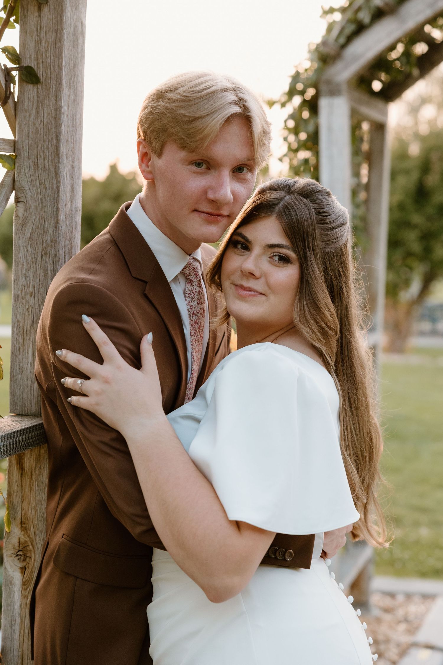 Romantic wedding couple embraces outdoors during golden hour in a series of intimate portrait shots.